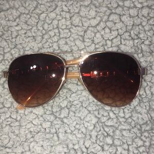 Brown and gold sunglasses